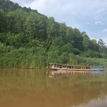 Travel on the Mekong River in Laos