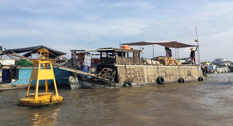 Pumpkin Vendor in the Cai Rang Floating Market in Can Tho, Vietnam