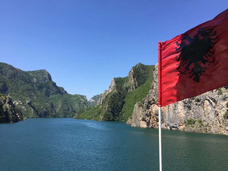 Albanian Flag over Lake Koman, Albania