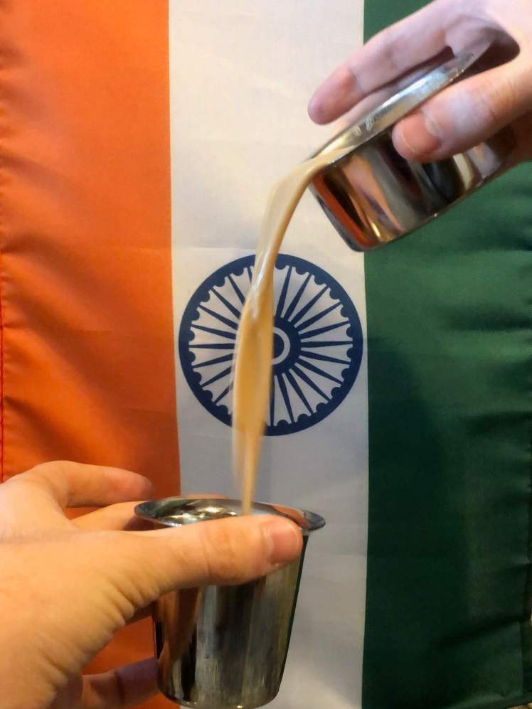 Pouring South Indian Filter Coffee